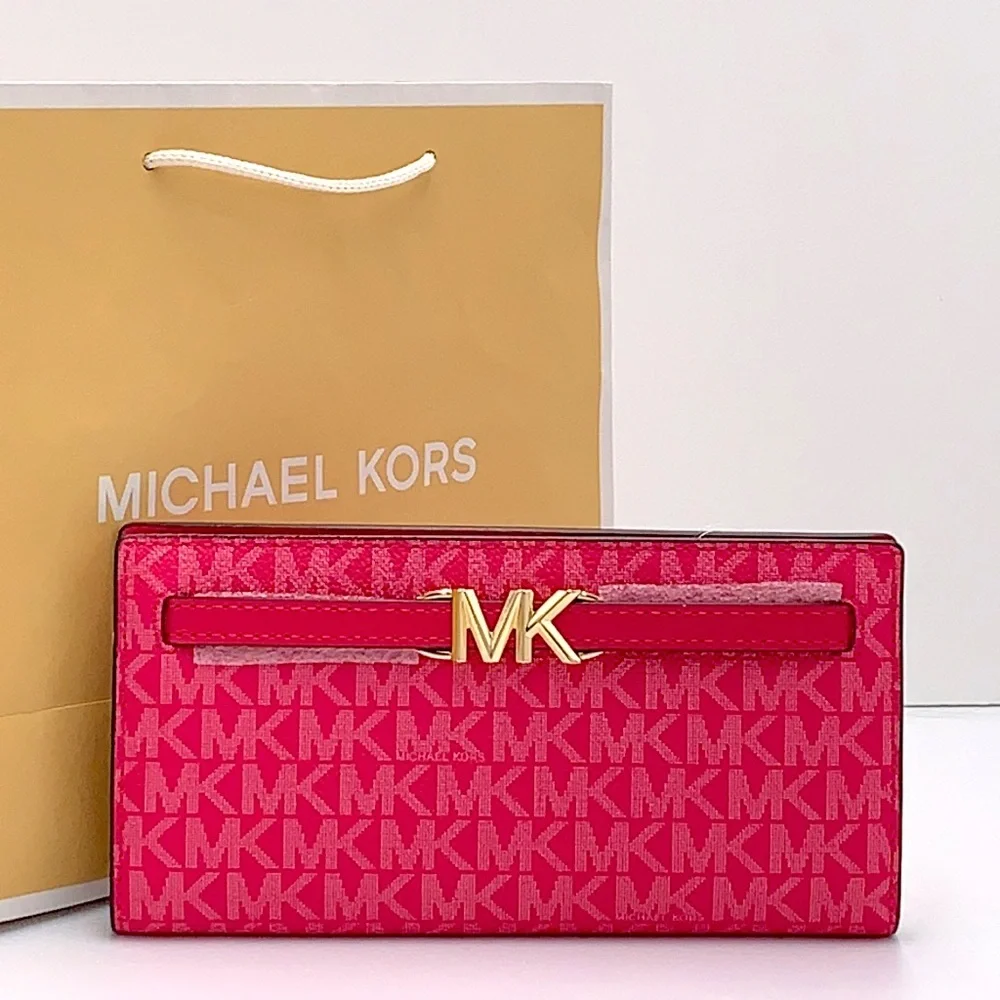 MICHAEL KORS Reed Large Snap Signature Wallet Electric Pink color
